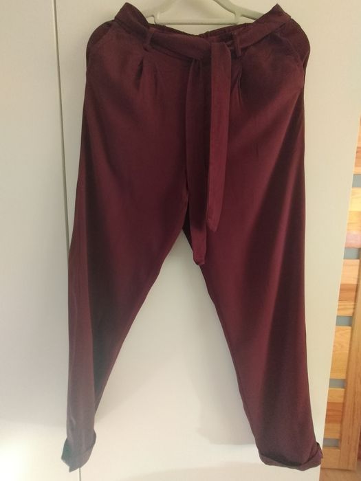 Letnie spodnie na gumce marki Carry rozmiar XS stan bardzo dobry.