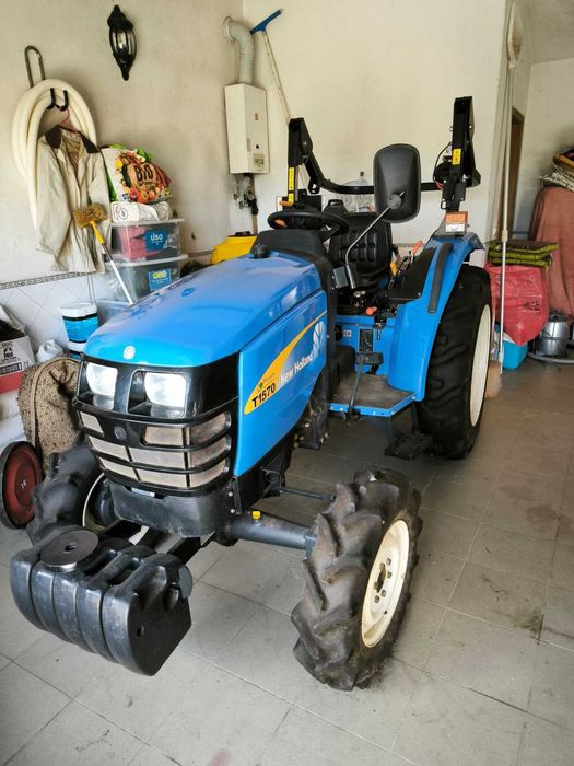 New Holland T1570 33CV – 88 Horas + 4 Acessórios