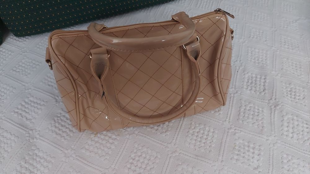 Bolsa usada em bom estado, para desolcupar.