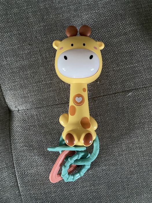 Музичне розвиваюче брязкальце гризунець «Жирафа»