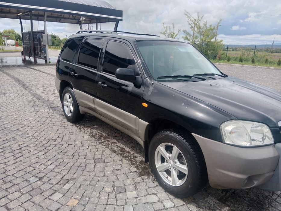 Мазда трибют повний привод