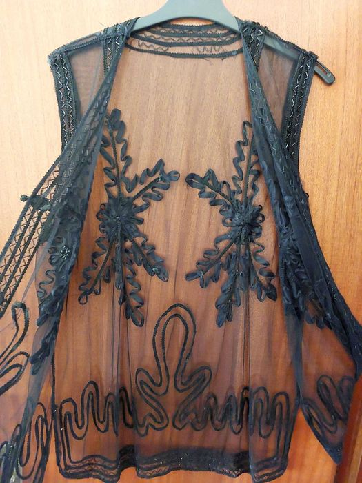 Túnica preta transparente