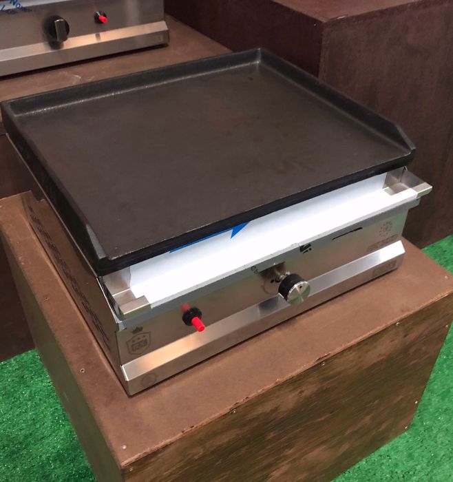 Placa de grelhar de ferro elétricas e a gás