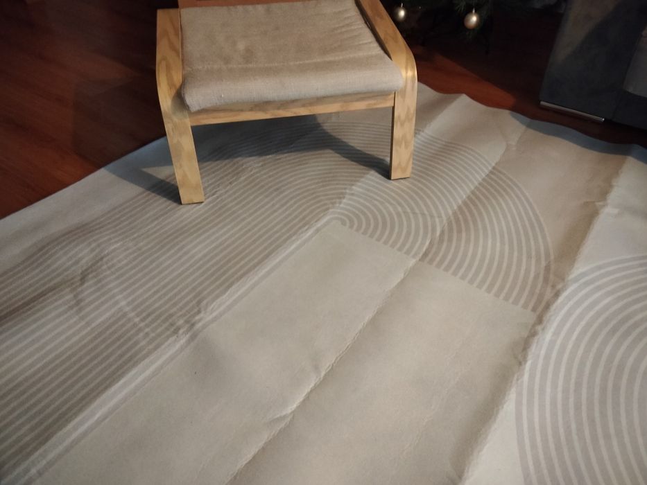 New living/dining room rug measuring 180*280 cm.