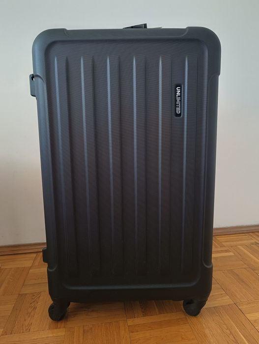Walizka firmy UNLIMITED (WINGS) ABS KANSAS duża L 28" nowa