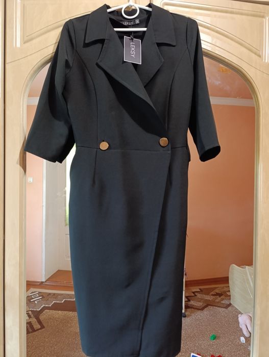 Плаття-піджак, нове чорного кольору.