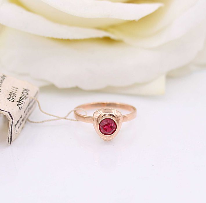 Złoty pierścionek p.585/1,77g z różowym kamieniem