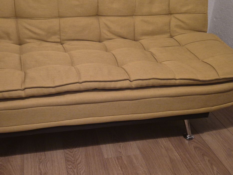 Sofá-cama amarelo