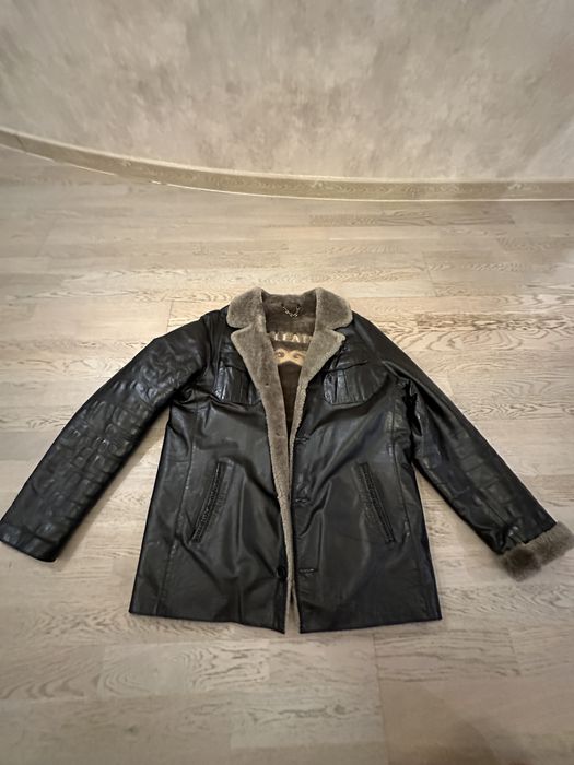 Куртка зимня довга