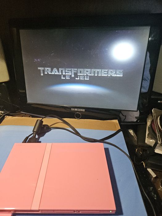 Ps2 rosa com dois comandos