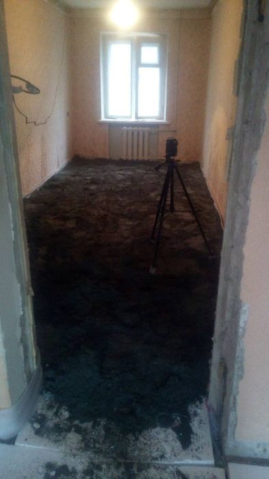 Машинная полусухая стяжка пола. Стяжка пола Киев . Заливка пола
