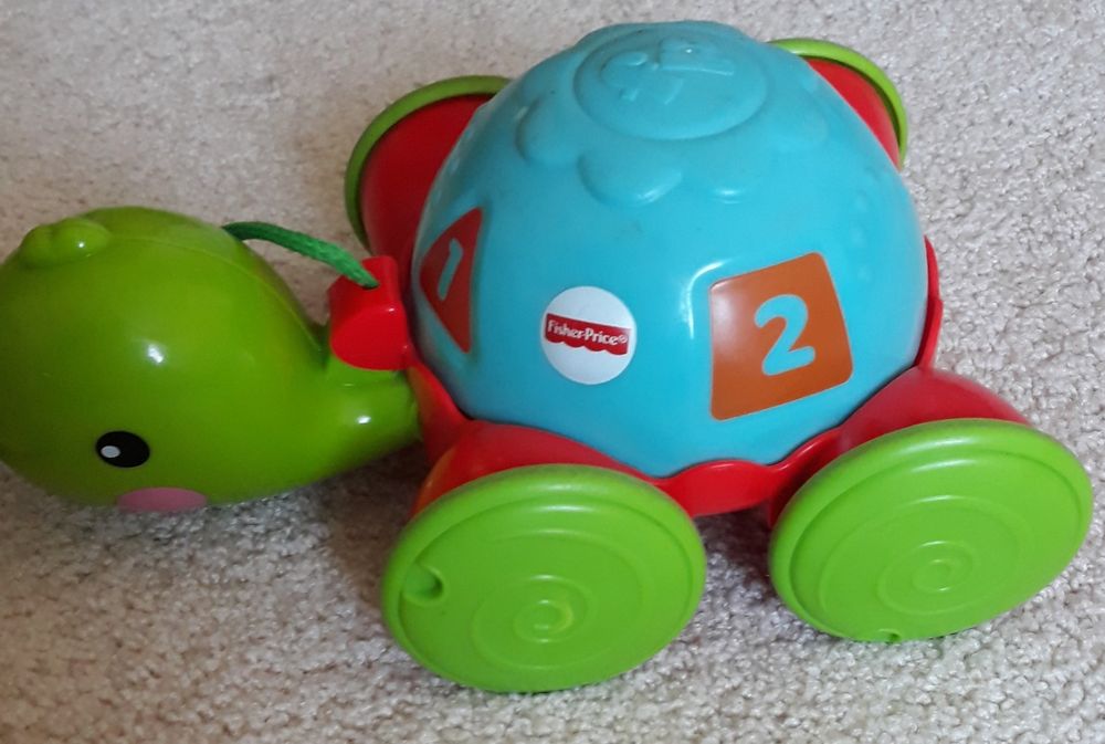 Jeżdżący żółw Fisher Price