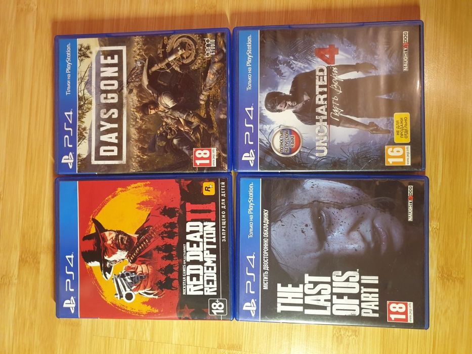 Консоль Sony PlayStation 4 PRO 1TB CUH 72 Black + 4 диска з іграми