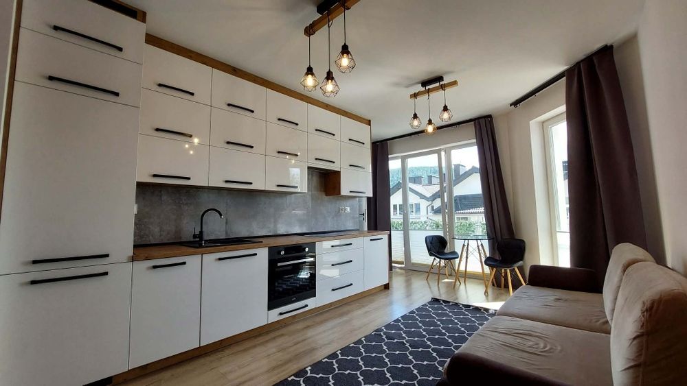 Apartament  2 pokoje + garaż + balkon+ komórki