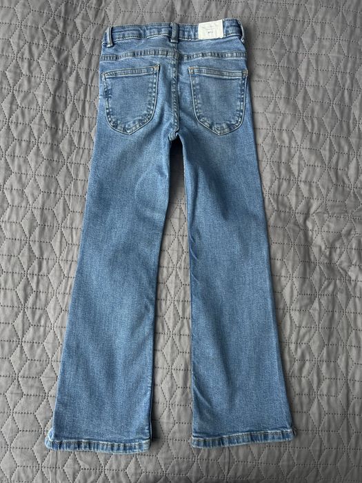 Джинси кльош «Mango” на дівчинку,122 см