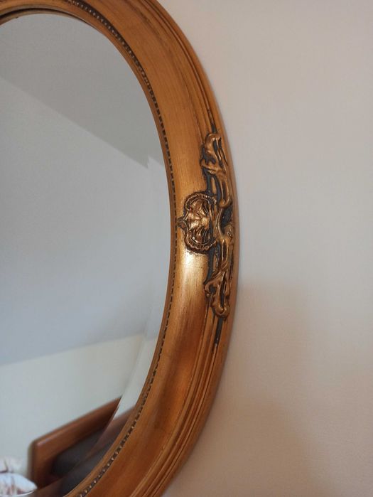 Lustro owalne w złotej ramie 60x50