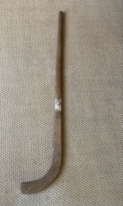 Botas, taco e bola de Hóquei anos 50