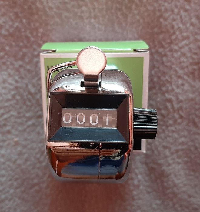 Contador de mão metálico