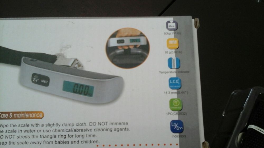 Balança de mão portátil