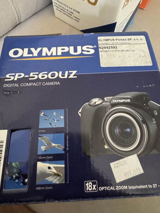 Aparat OLYMPUS SP-560 udzkodzony obiektyw, brak klapki baterii