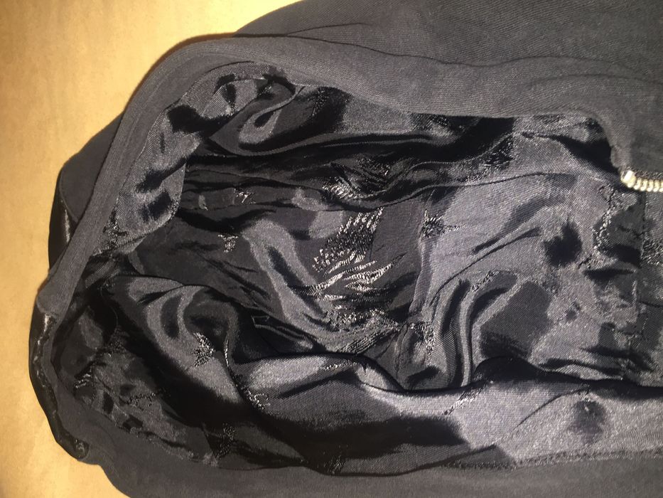 Casaco menino 10 anos exelente estado.