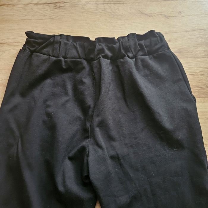 Spodnie czarne eleganckie,wysoki stan rozm.44. jak nowe.