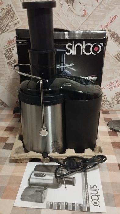 Соковитискач для фруктів . Соковижималка електрическая .