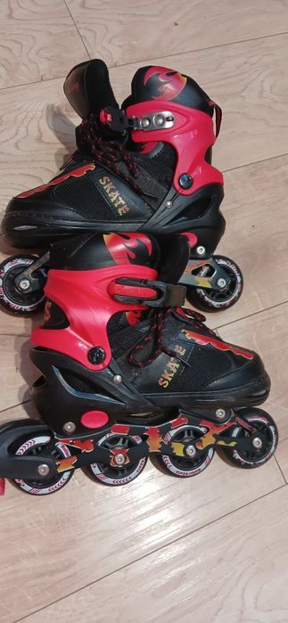 Дитячі яскраві майже нові ролики рр 35 38,