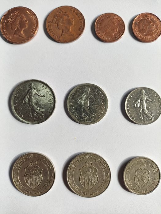 Moedas Escudos, Pesetas, Francos, Dinars, Real