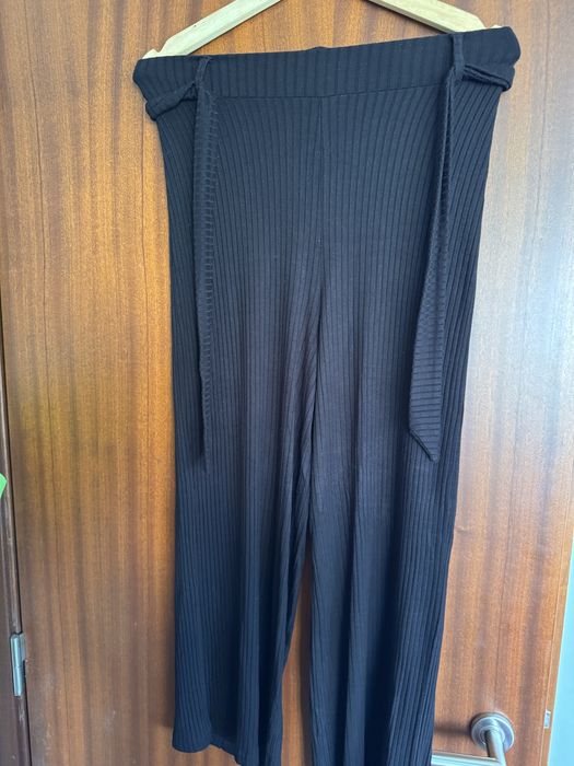 Calças pretas elasticas