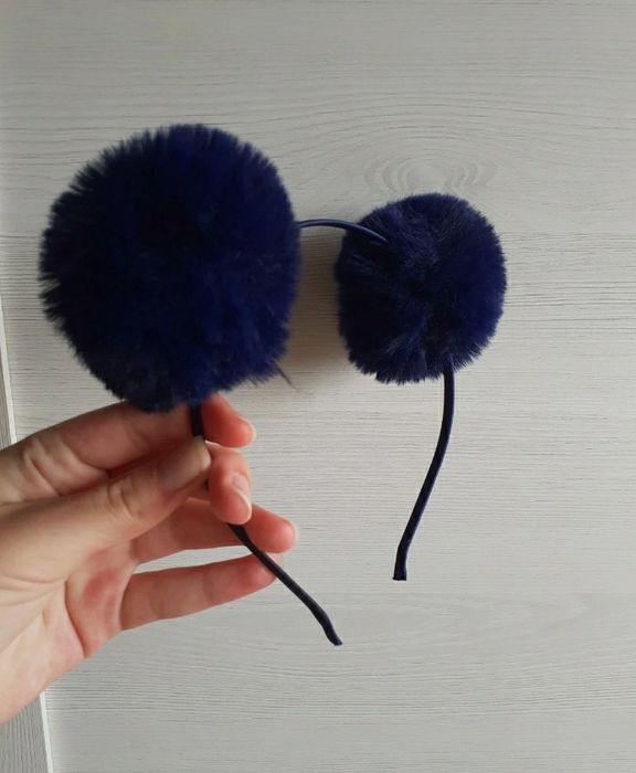 Bandolete com pom poms