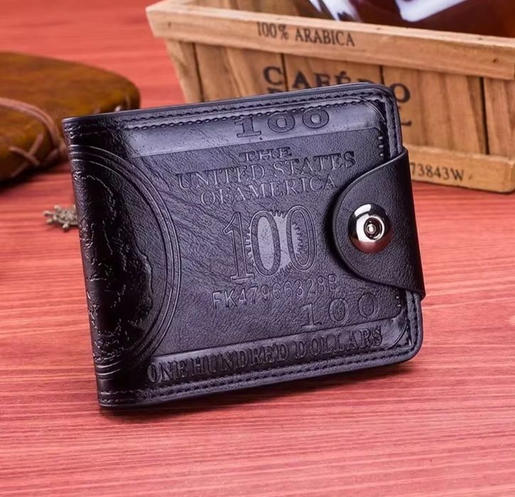 Чоловічий гаманець зі 100 доларовим візеркнком