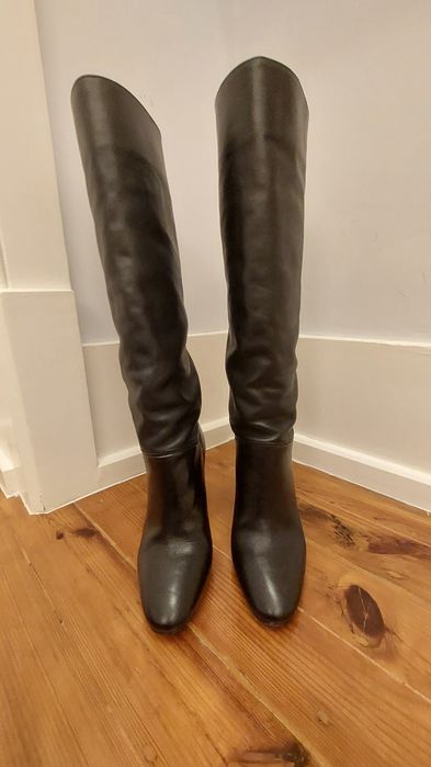 Botas altas pretas de óptima qualidade