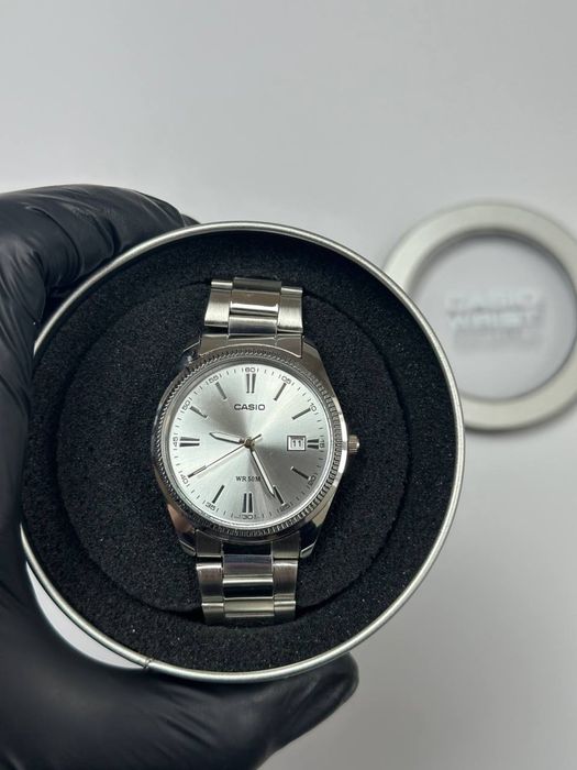 Годинник Casio MTP-1302/Часы касио