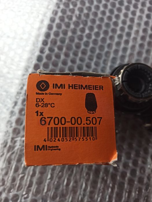 Термоголовка на радиатор отопления Германия