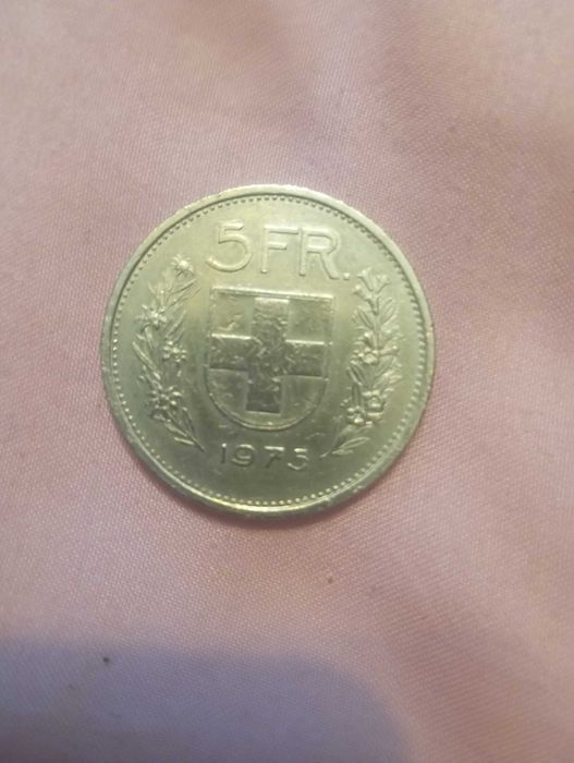 Vendo moeda Suiça de 5 francos.Ano: 1975.