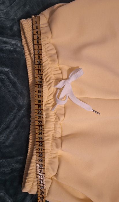 Spodnie żółte nogawki wiązane roz.XL