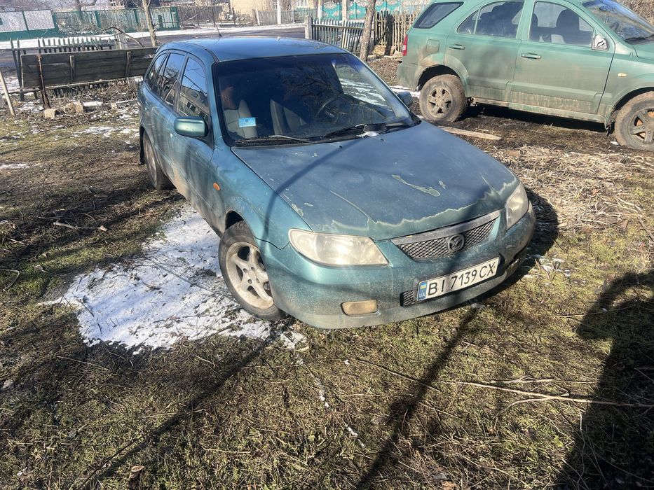Мазда 323 f газ бензин