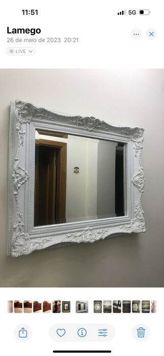 Espelho com moldura branca e trabalhada