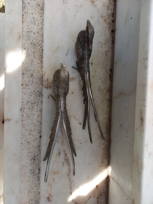 Casal de pavões em liga metálica