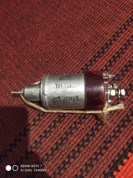 Реле втягивающее новое.