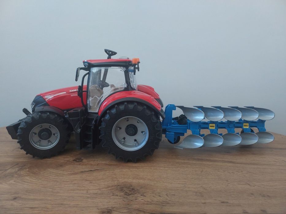 BRUDER  traktor Case IH Optum 300 + 2 przyczepy + pług