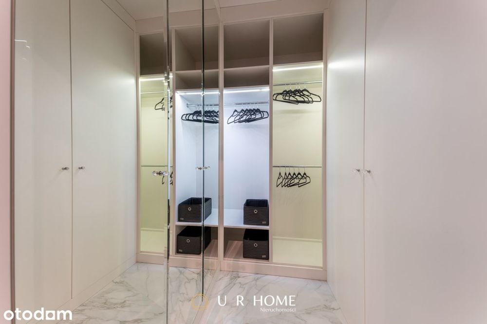 Elegancki apartament z garderobą, garażem i komórk