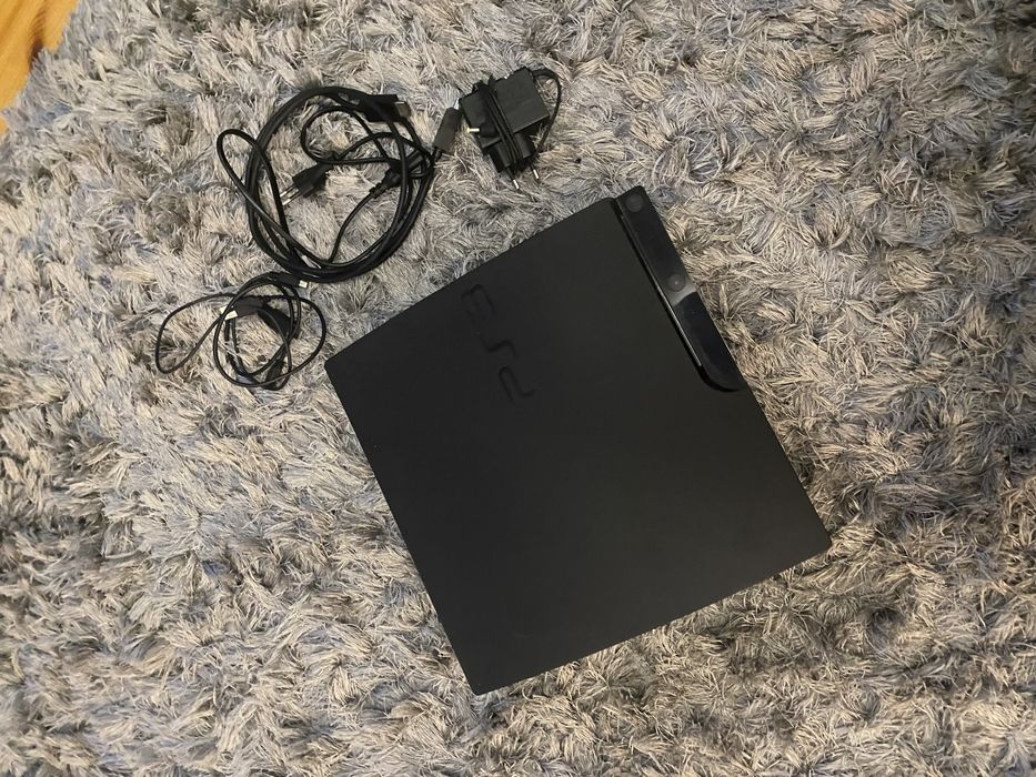 Playstation 3 + 17 gier + pady + alcesoria (Move/Skylanders/Singstar)