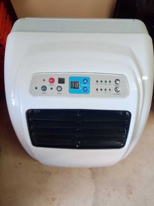 Ar condicionado portátil em ótimo Estado e a funcionar perfeitamente