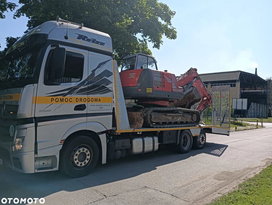 Pomoc drogowa Katowice Laweta 24 Transport maszyn i koparek slask