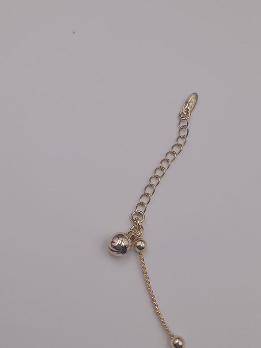 Bransoletka pozłacana 14 k z kuleczkami