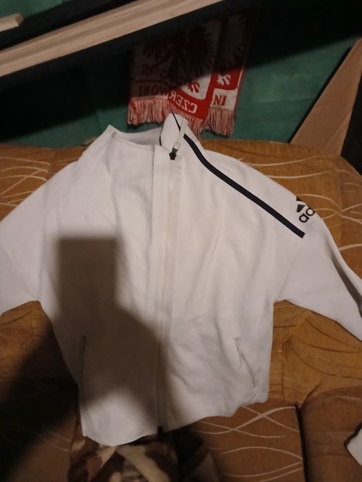 7 ubran 3 kurtki 2 nowe bluza i dwie sukienki na sylwestra