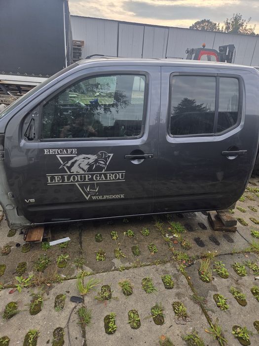 Drzwi przód tył prawe lewe nissan navara D40 KAP K669