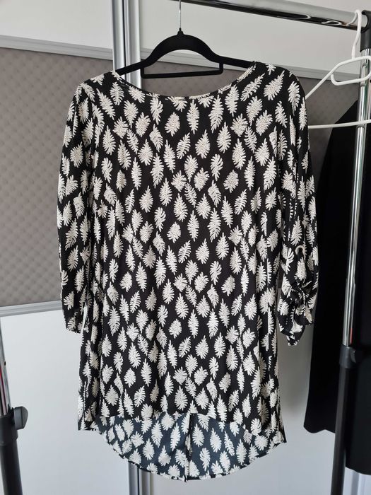 Długa elegancka bluzka z rozcięciem z tyłu r. 44